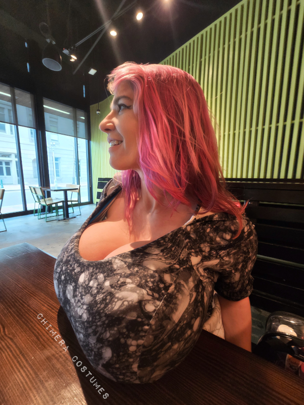 Educational diagram-style image illustrating the internal anatomy of breast tissue including lobes, ducts, nipple, and surrounding structures